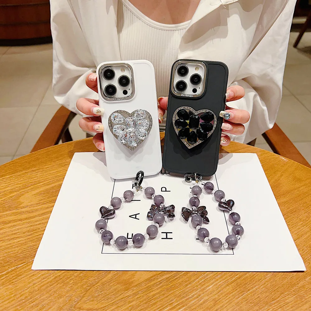 Stone Heart Shape Stand Silicone Soft Phone Case with Bracelet - iPhone 15 Pro Max